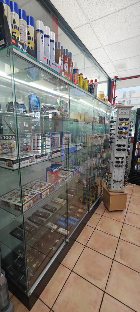 All Glass Case 48" X 72" Hight X18" Deep Frameless Black Bace Color